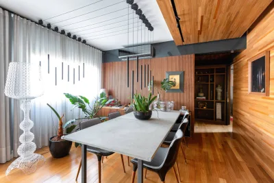Repetição de elementos e integração de ambientes garantem unidade a apartamento de 95 m²