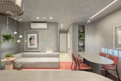 Apartamento de 78 m² tem ar futurista com cantos arredondados e muito cinza