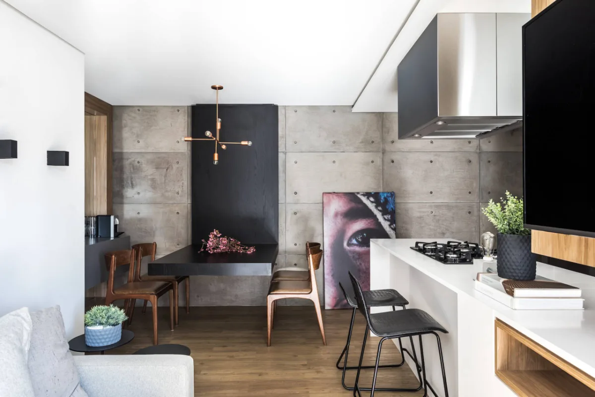 Projeto da UNIC Arquitetura para apartamento de 65 m² une multifuncionalidade com linguagem industrial.