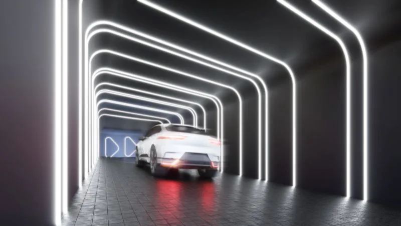 Garagem com iluminação automatizada e ponto de recarga para veículos elétricos. Imagem: Divulgação