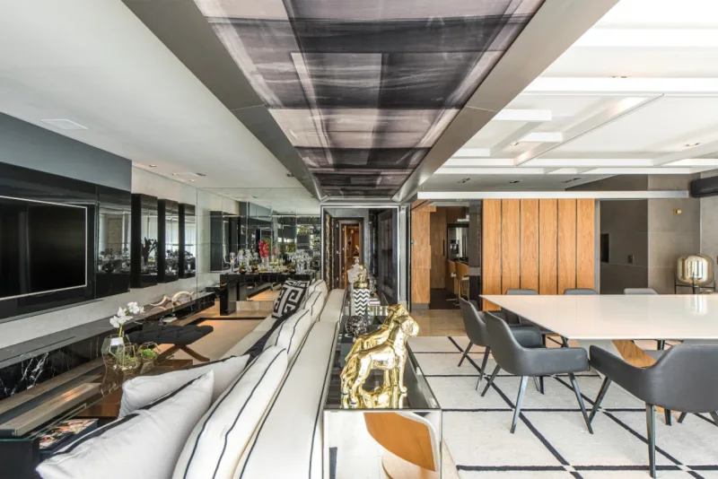 Ambientes integrados, mas bem delimitados são a marca do projeto que une elementos contemporâneos e clássicos. Foto : Marcelo Stammer