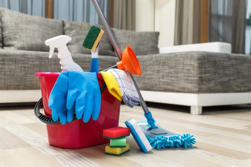 Cleaning service. Bucket with sponges, chemicals bottles and mopping stick. Rubber gloves, plunger and towel. Household equipment.