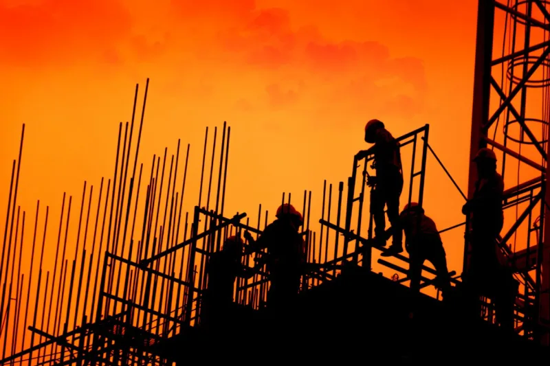 Construction worker working on a construction site,for construction teams to work in heavy industry, high ground and safety concepts.