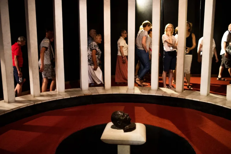 Tourists at the Joseph Stalin Museum, in the Soviet dictator's home town of Gori, Georgia, May 6, 2019. The tone throughout the museum is admiring, a stirring narrative about a poor kid who, against long odds soared to the heights of power. Omitted are his millions of victims. (Daro Sulakauri/The New York Times)