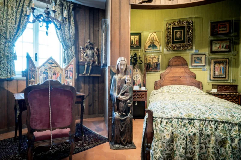A bedroom in the tower at Francesco Federico Cerruti’s villa in Rivoli, Italy, May 1, 2019. Cerruti’s collection consists of about 1,000 items displayed in the quirky Provençal-style villa he built in the 1960s. (Alessandro Grassani/The New York Times)