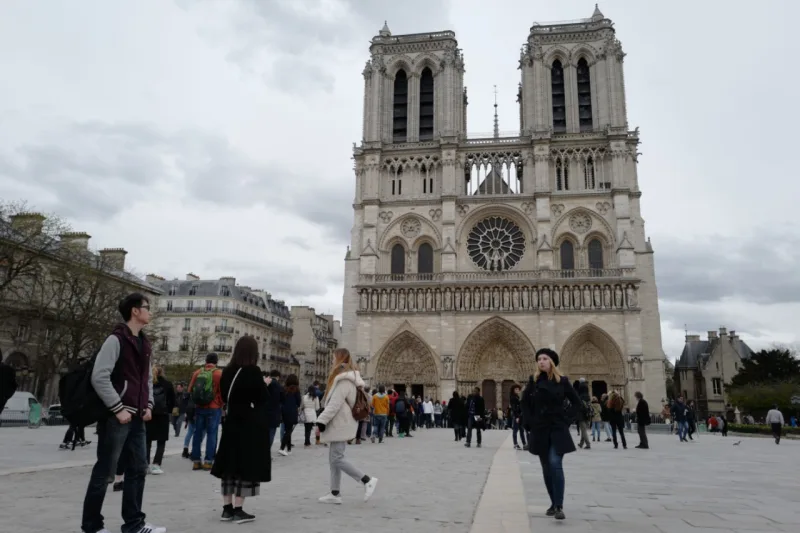 A picture taken on March 29, 2018 in Paris shows Notre-Dame de Paris Cathedral during the celebrations of Easter's Holy Thursday. (Photo by Ludovic MARIN / AFP)