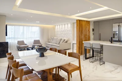 Reforma derruba paredes e remodela apartamento da planta ao design