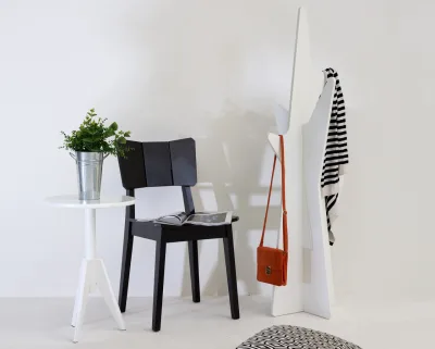 Aposte nas cadeiras e banquetas para incrementar a decoração