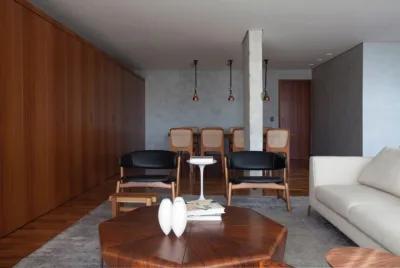 Concreto e madeira dão o tom desse apartamento atemporal e inspirador