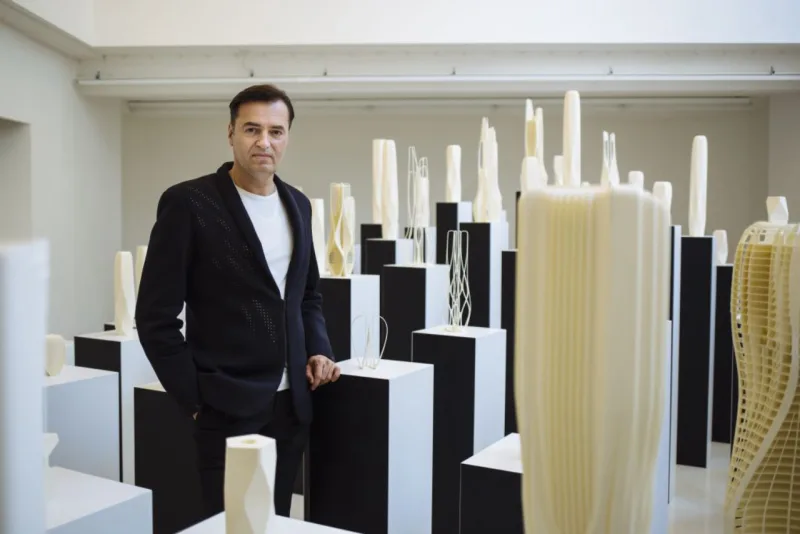 Patrick Schumacher, a partner at Zaha Hadid Architects, in a gallery of the firm's designs, in London, April 12, 2016. Schumacher, who worked alongside Hadid for 28 years, says the firm is moving forward with existing projects in the wake of her death. ÒWe want to tell the world that weÕre still a viable, vibrant address for major work of cultural importance,Ó he said. (David Azia/The New York Times)
