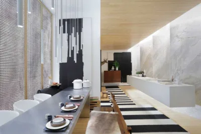 A superfície lisa do Corian apresenta flexibilidade por não ter oscilações em juntas, além de permitir indução eletromagnética (Divulgação/Studio Guilherme Torres)