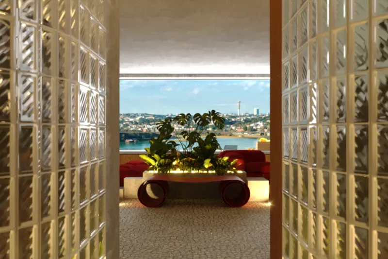 Na entrada da sala de estar, há um vidro em forma curvada, que, segundo descrição do projeto, “direciona o caminho e estimula a descoberta do espaço”.