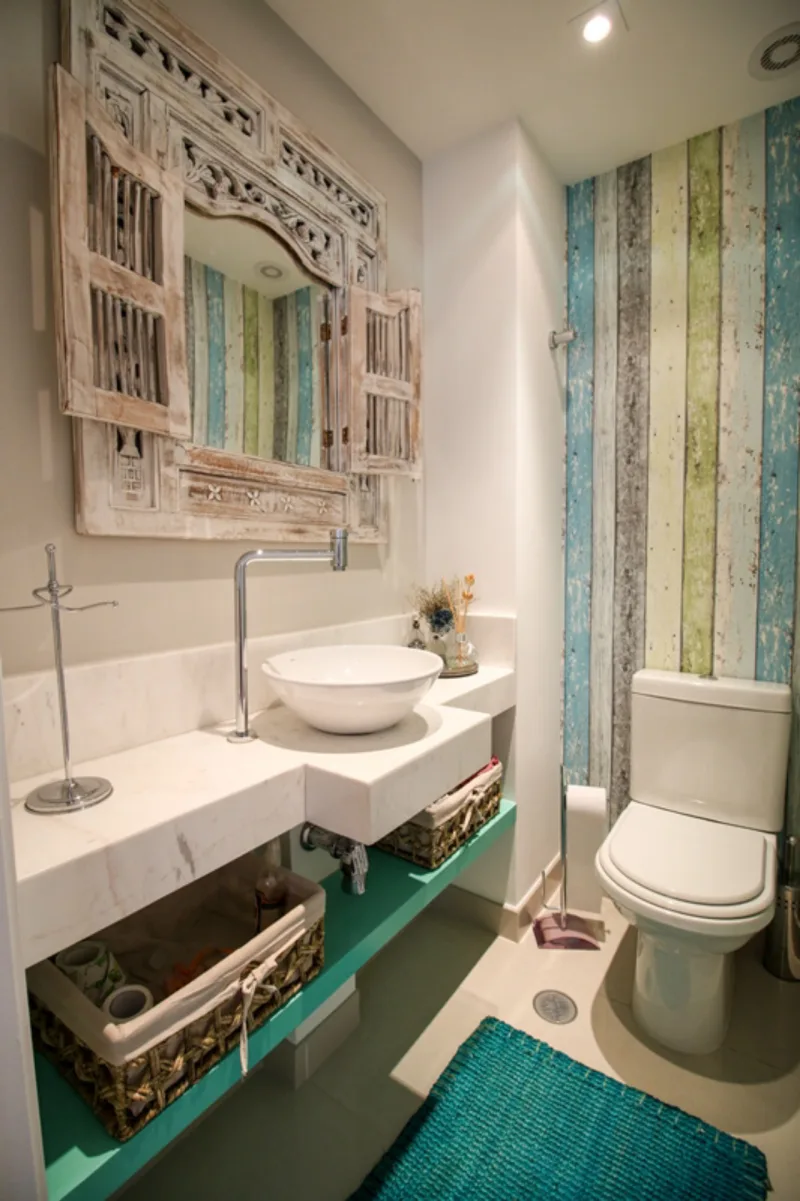 Cores em tons pastel e um estilo rústico fazem deste um lavabo delicado que recebeu revestimento de madeira de demolição.
Foto: Divulgação