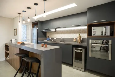 Projeto de cozinha integrada assinada pela arquiteta Letícia Kunow. Atenção na hora de instalar o cooktop é determinante para a segurança e conforto do ambiente. 
Foto: Divulgação 