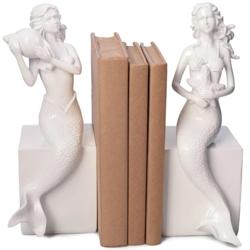 Apoio para livros de resina em forma de sereias. Na SouQ, R$ 219