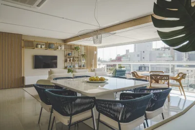 Cores e formas que remetem à areia e ao mar dão o tom da decoração de apê de 130 m² na praia